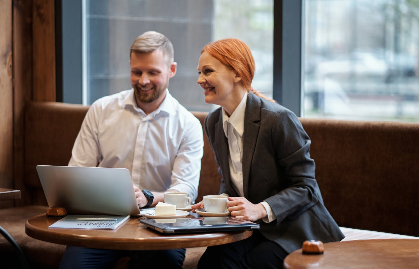 Two professionals having a coffee meeting
